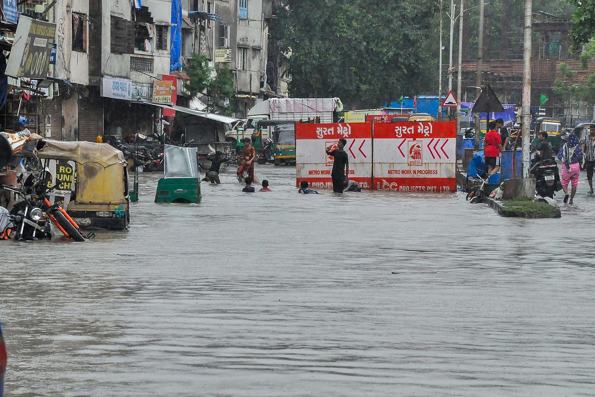 A locality flooded by the Tapi river after release of water from the Ukai Dam, in Surat, on September 18, 2023.