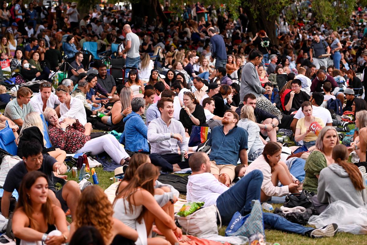 People gather to celebrate New Year’s Eve in Sydney, Australia, on December 31, 2022. 