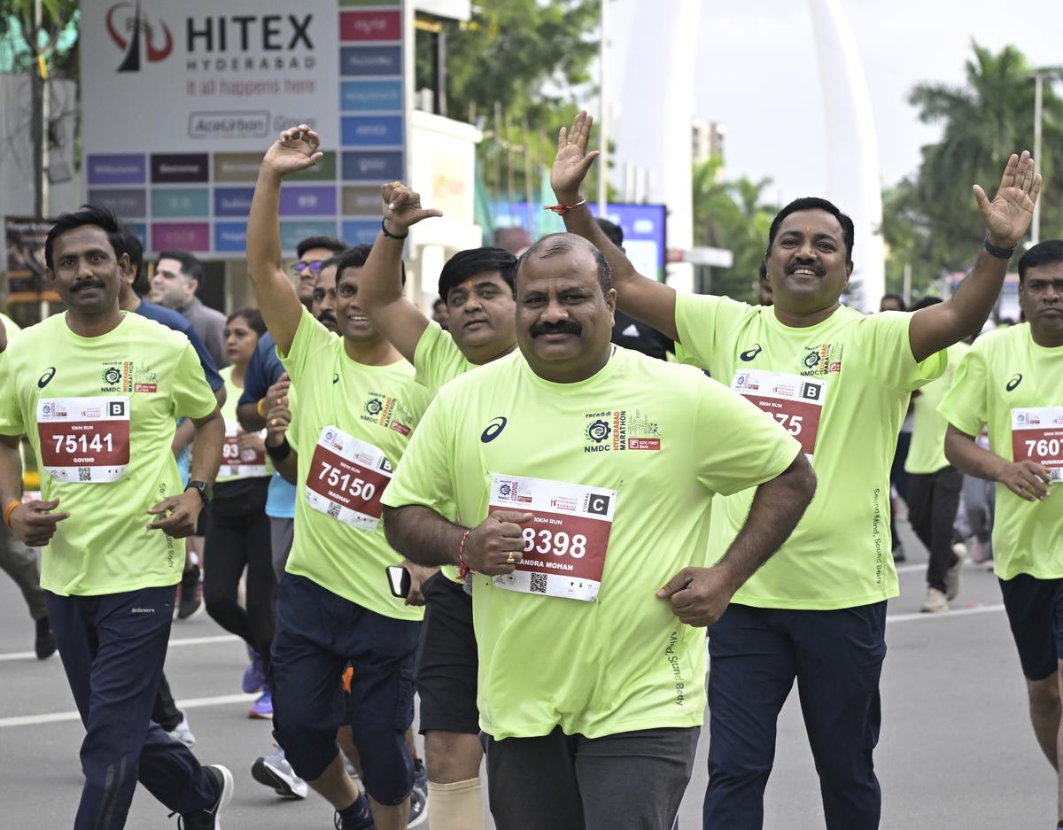 Runners in action during the 14th edition of the NMDC Hyderabad Marathon in Hyderabad on Saturday.