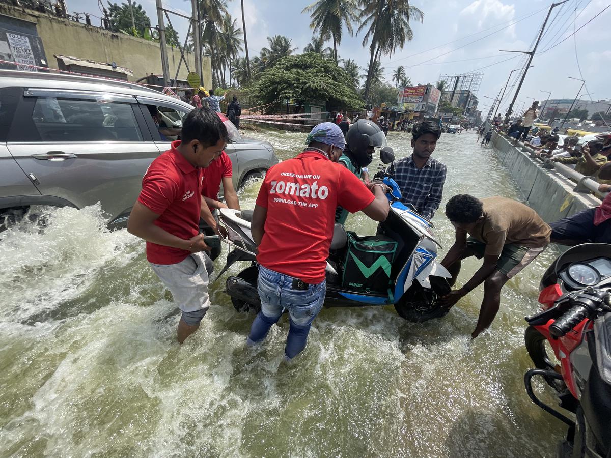 Food delivery workers could also be seen pushing several two-wheelers that broke down while trying to get past the inundated road.