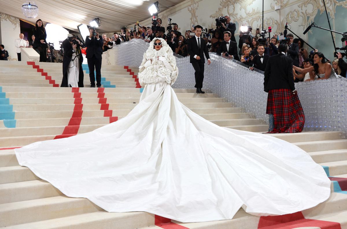 Rihanna poses at the Met Gala