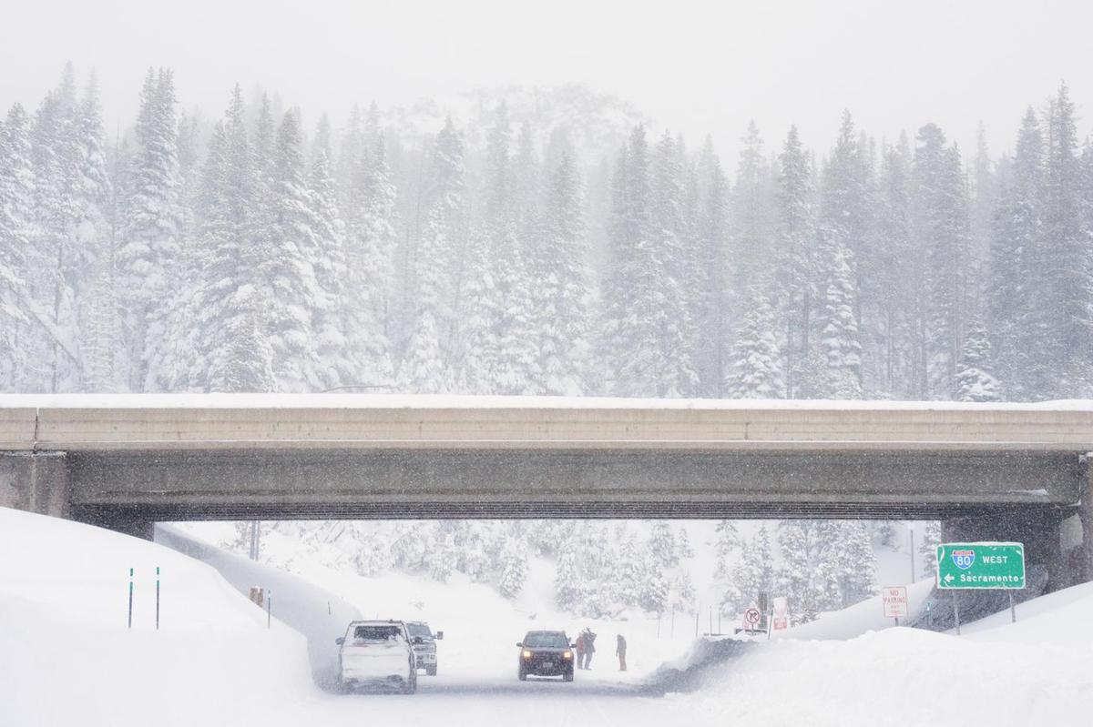Snow covers a road on an underpass along interstate 80 near Soda Springs, California, on February 18, 2026.