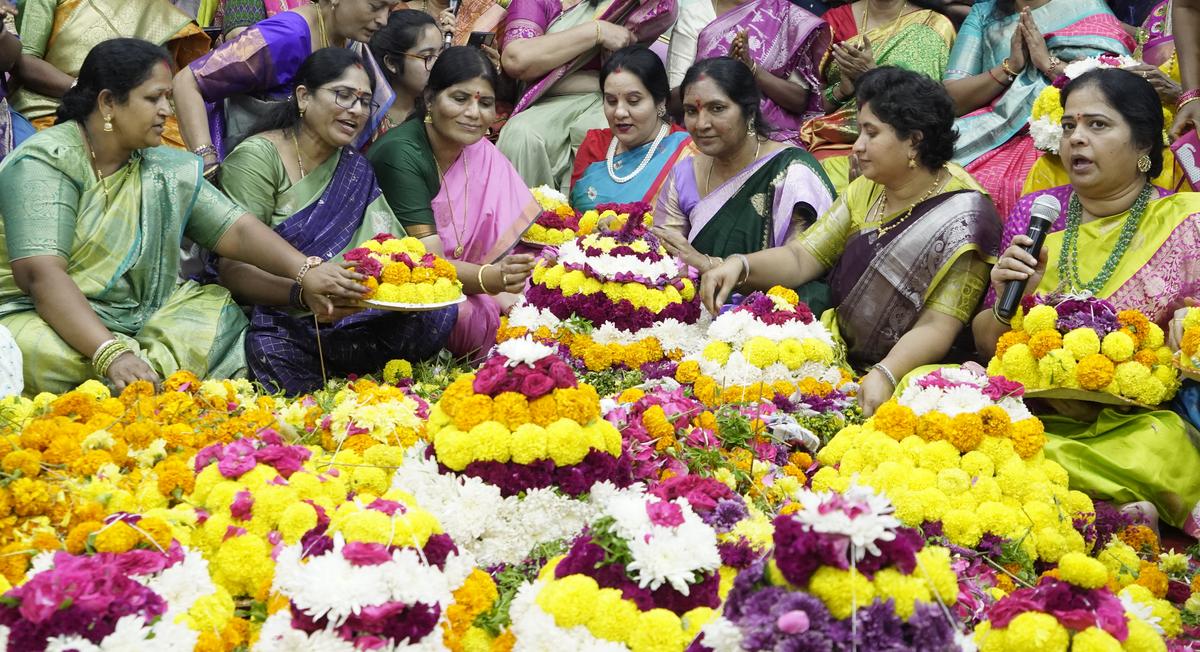 Women celebrate Bathukamma at Telangana Bhavan in Hyderabad on Sunday.