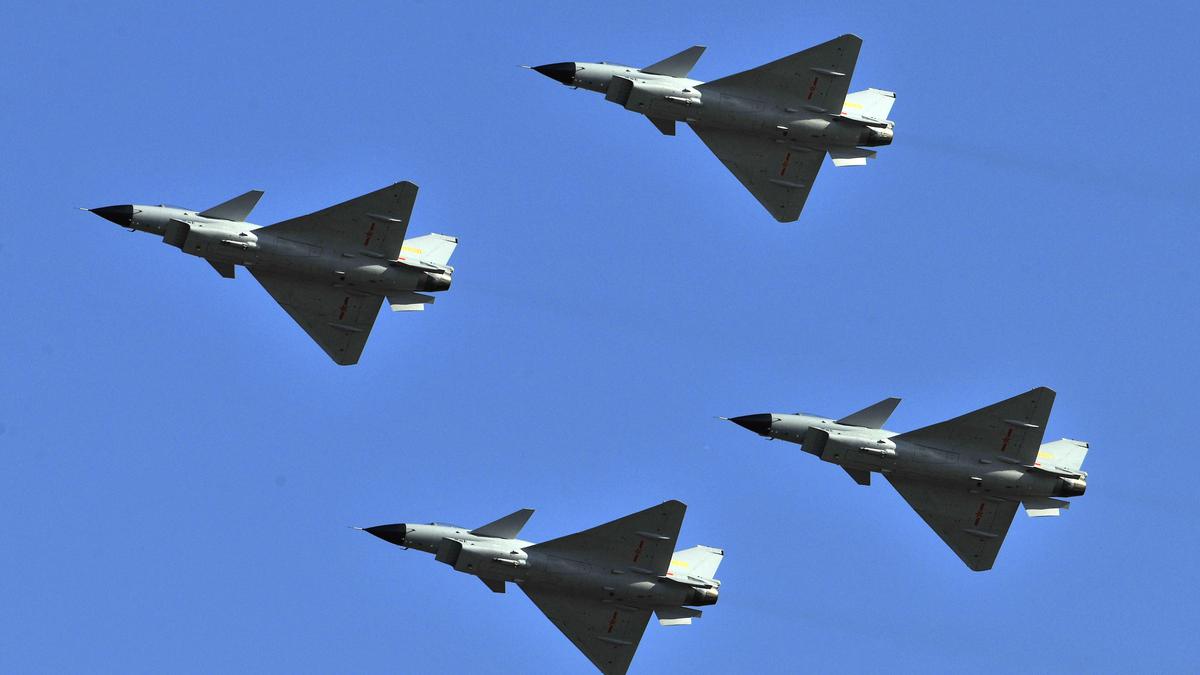 As Taiwan prepares for anti-invasion exercises, China sends dozens of warplanes toward the island