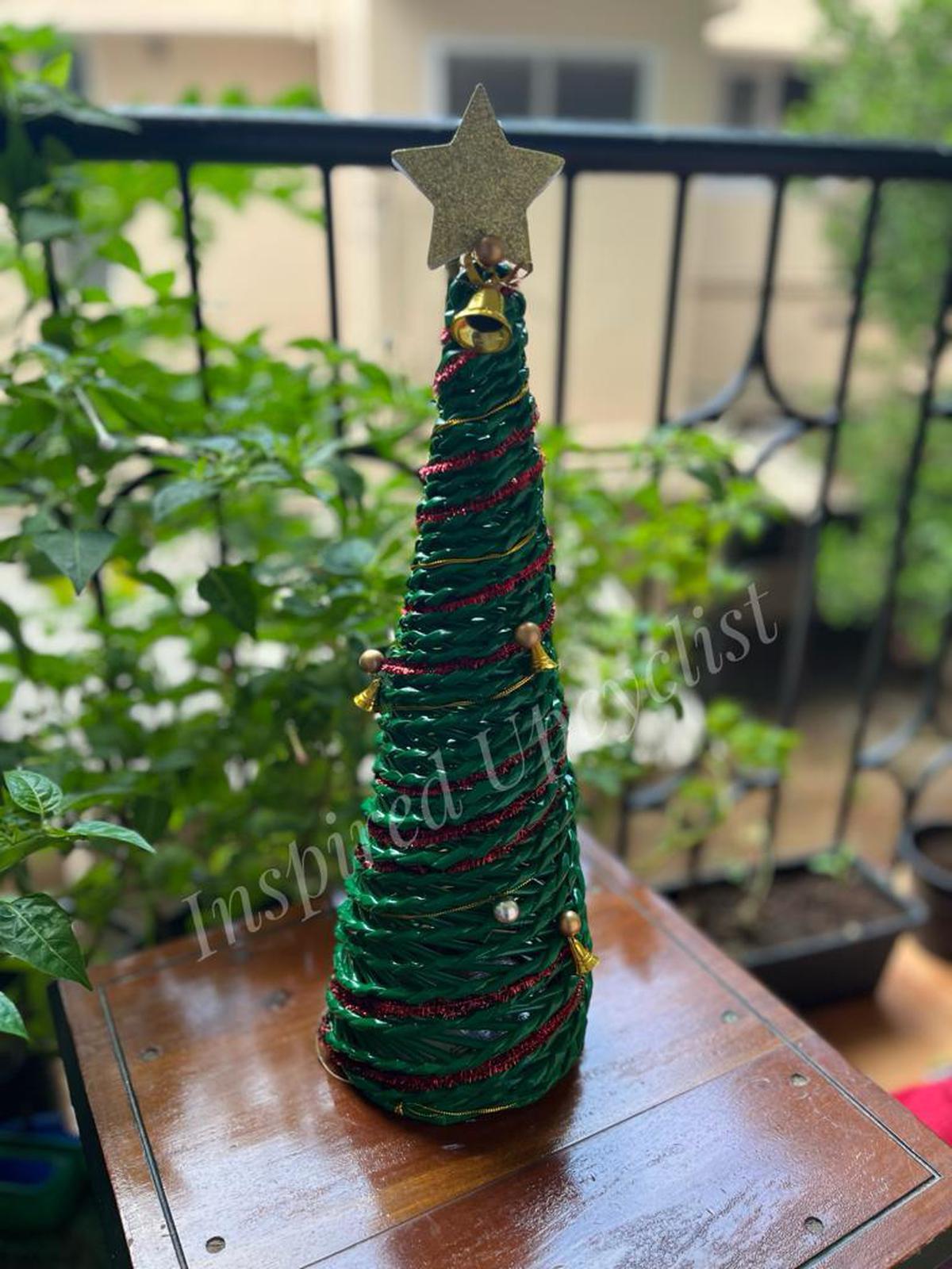  A Christmas tree made from recycled  newspaper by Parvathi Mayamadhavi.