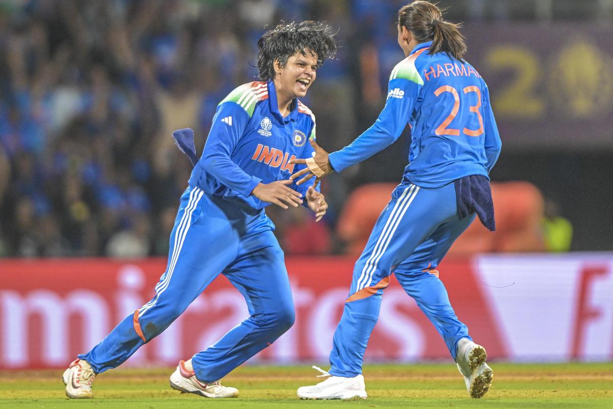 India’s Shafali Verma and Harmanpreet Kaur celebrate the wicket of South Africa's Marizanne Kapp during the Women’s World Cup final.