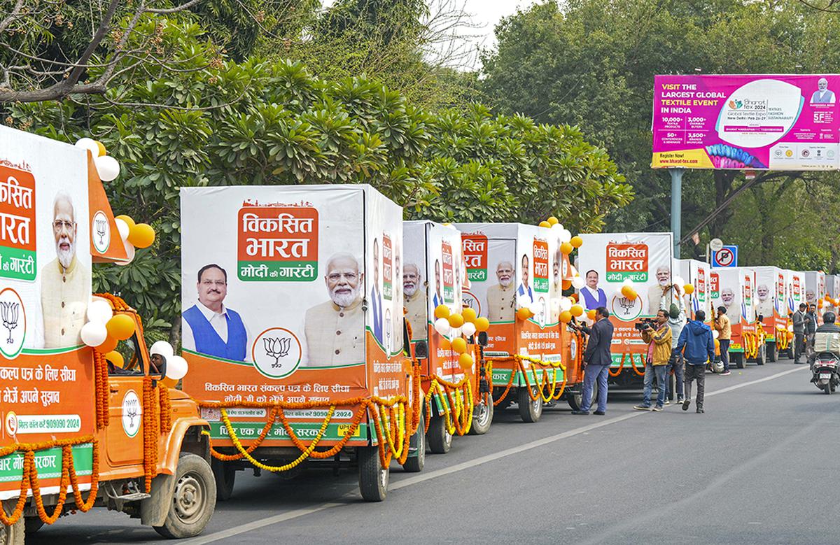 New Delhi: Viksit Bharat Modi Ki Guarantee Raths during their flagging off by BJP National President J P Nadda, in New Delhi, Monday, Feb. 26, 2024
