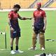 RCB’s new signing Jordan Cox is all ears as Virat Kohli makes a point during practice on Wednesday.