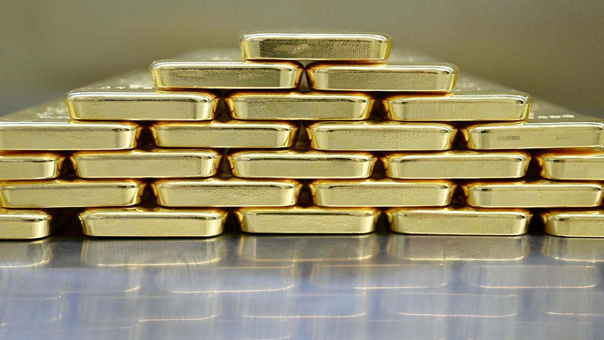 Gold declines from record high on profit booking, U.S. government shutdown worries