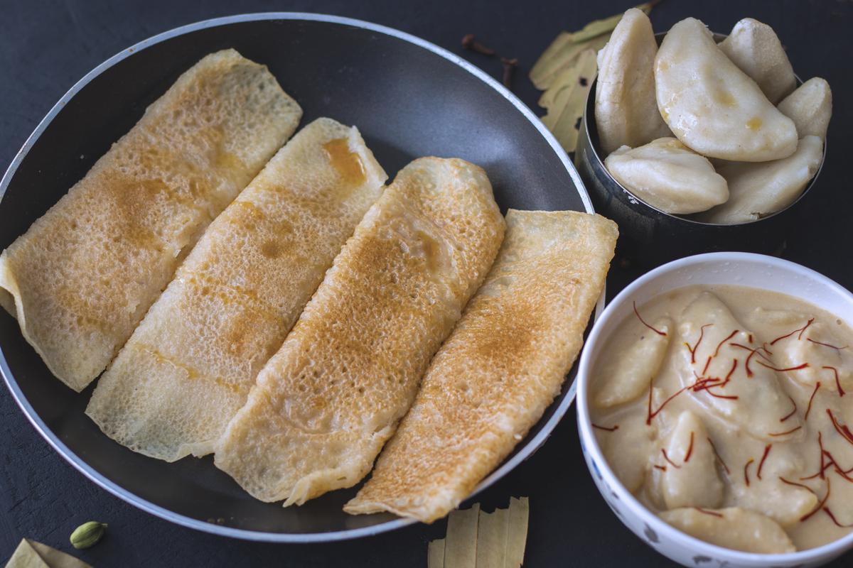 'Pita-puli', one of the famous Bengali food in the winter season.  Made from rice powder, milk and sugar syrup.  bengali story