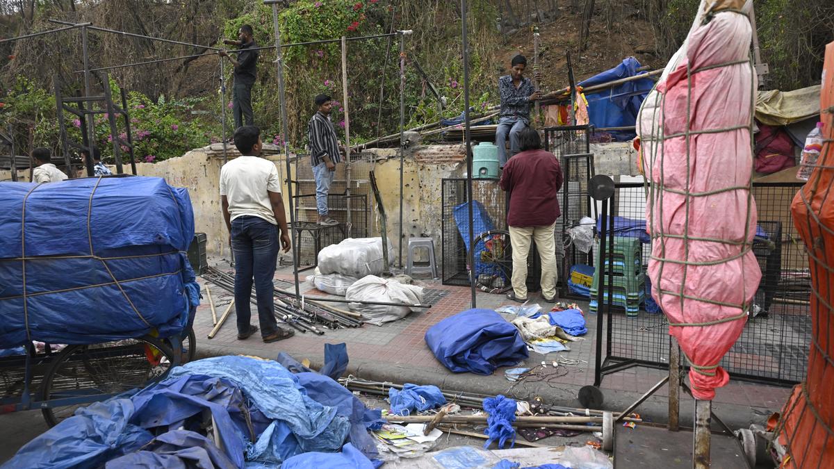 GHMC faces resistance from shop keepers during demolition drive near Monda Market GHMC faces resistance from shop keepers during demolition drive near Monda Market