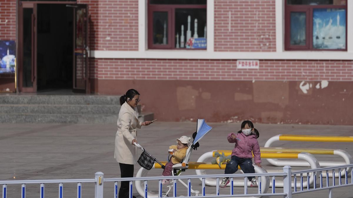 China looks to spur births, aid families in fight on shrinking population