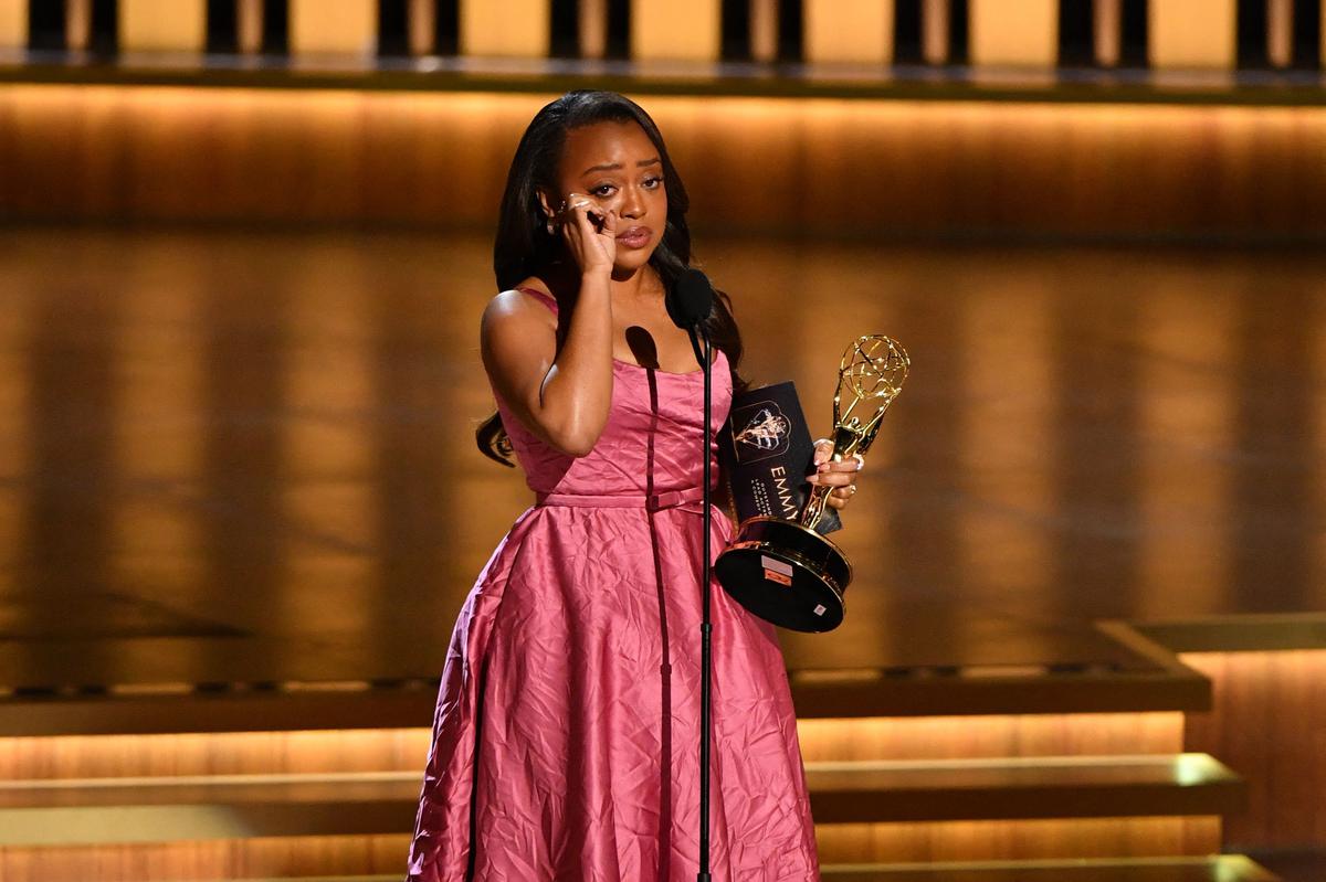 TOPSHOT - Outstanding Lead Actress in a Comedy Series Quinta Brunson, Abbott Elementary, accepts her award onstage during the 75th Emmy Awards at the Peacock Theatre at L.A. Live in Los Angeles on January 15, 2024. (Photo by Valerie Macon / AFP)