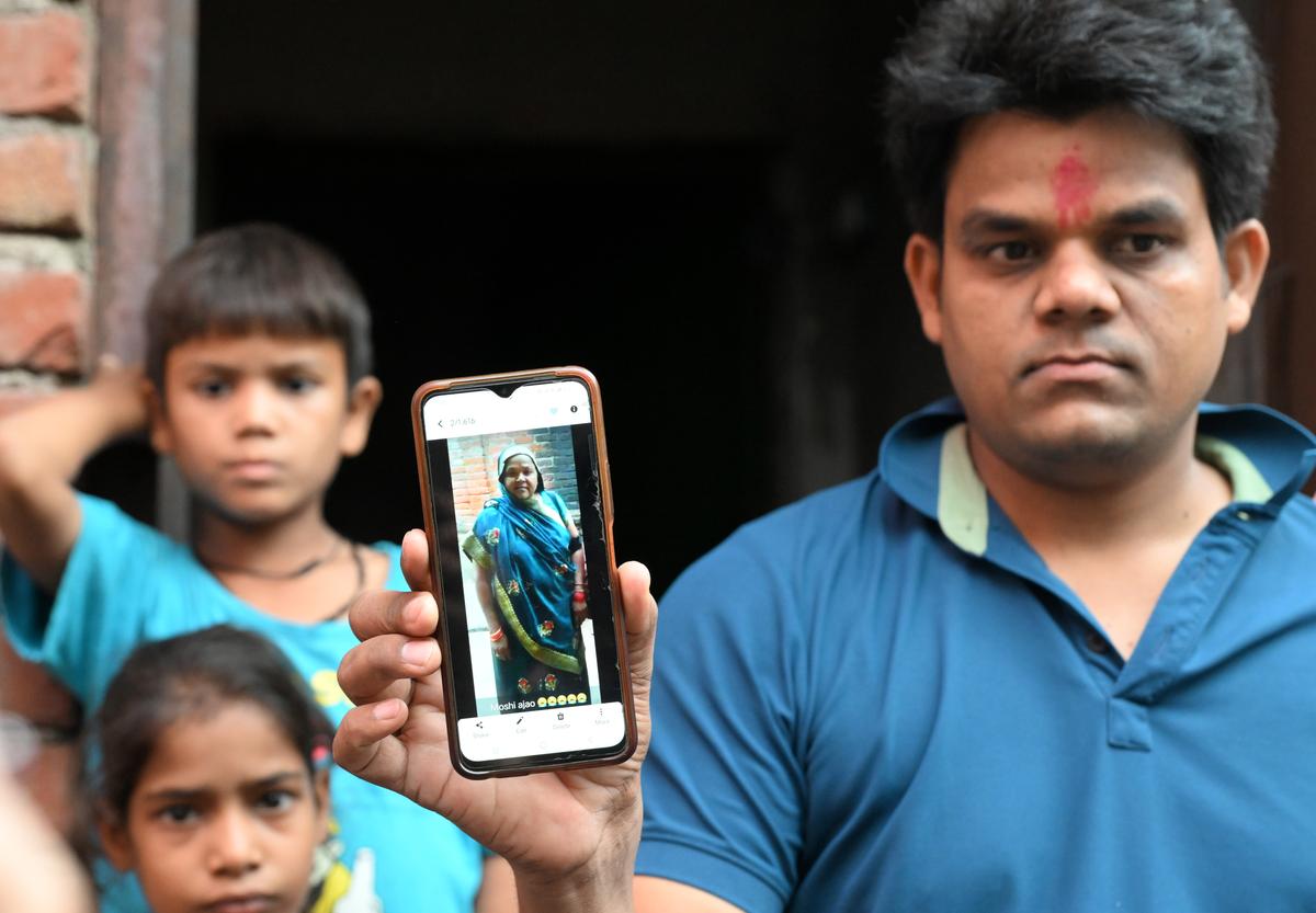 Harikant shows a picture of his mother, Asha Devi.