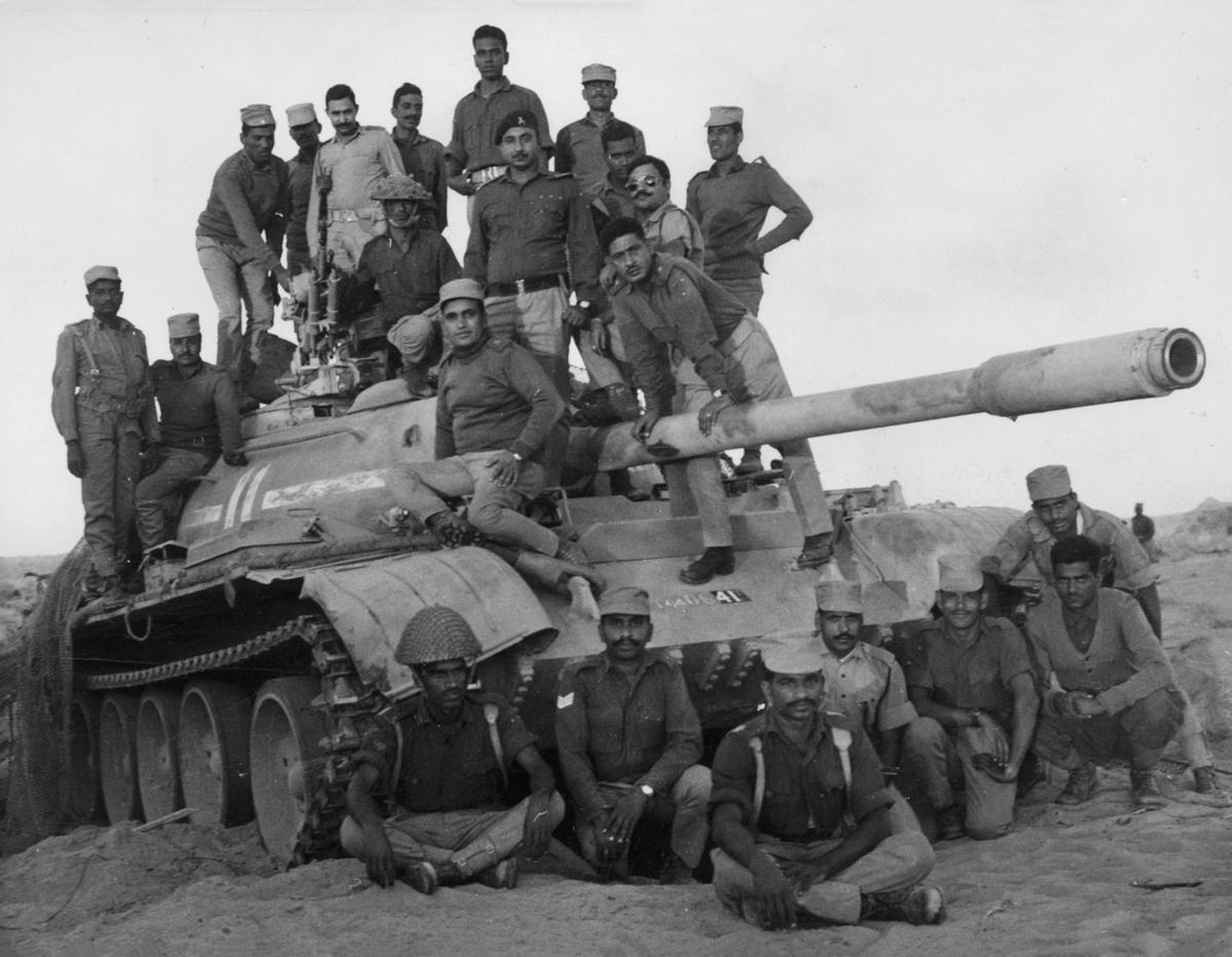 Indian Army officers and jawans standing atop a disabled Pakistani tank in the Longanavala area of the Rajasthan sector on December 11, 1971. Indian Army officers and jawans standing atop a disabled Pakistani tank in the Longanavala area of the Rajasthan sector on December 11, 1971.
