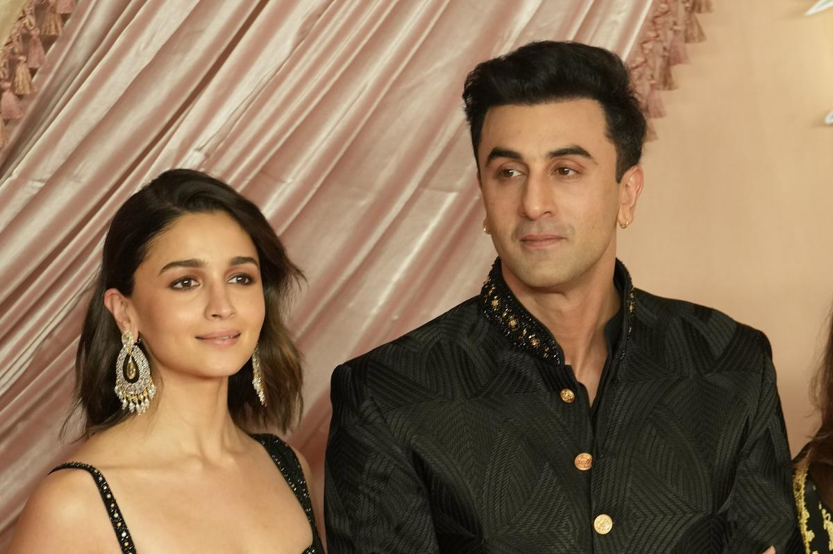 Bollywood actress Alia Bhatt and Her husband Bollywood actor Ranbir Kapoor pose for a picture during pre-wedding ceremony of Ambani’s youngest son Anant Ambani to Radhika Merchant, in Mumbai, India, Friday, July 5, 2024