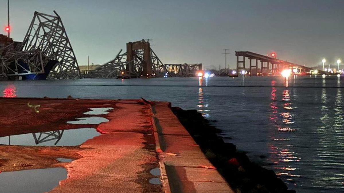 Cargo ship hits Baltimore’s Key Bridge, causing it to collapse; rescuers search for seven in water