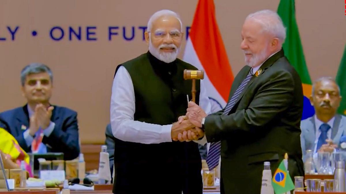 India hands over G-20 presidency to Brazil