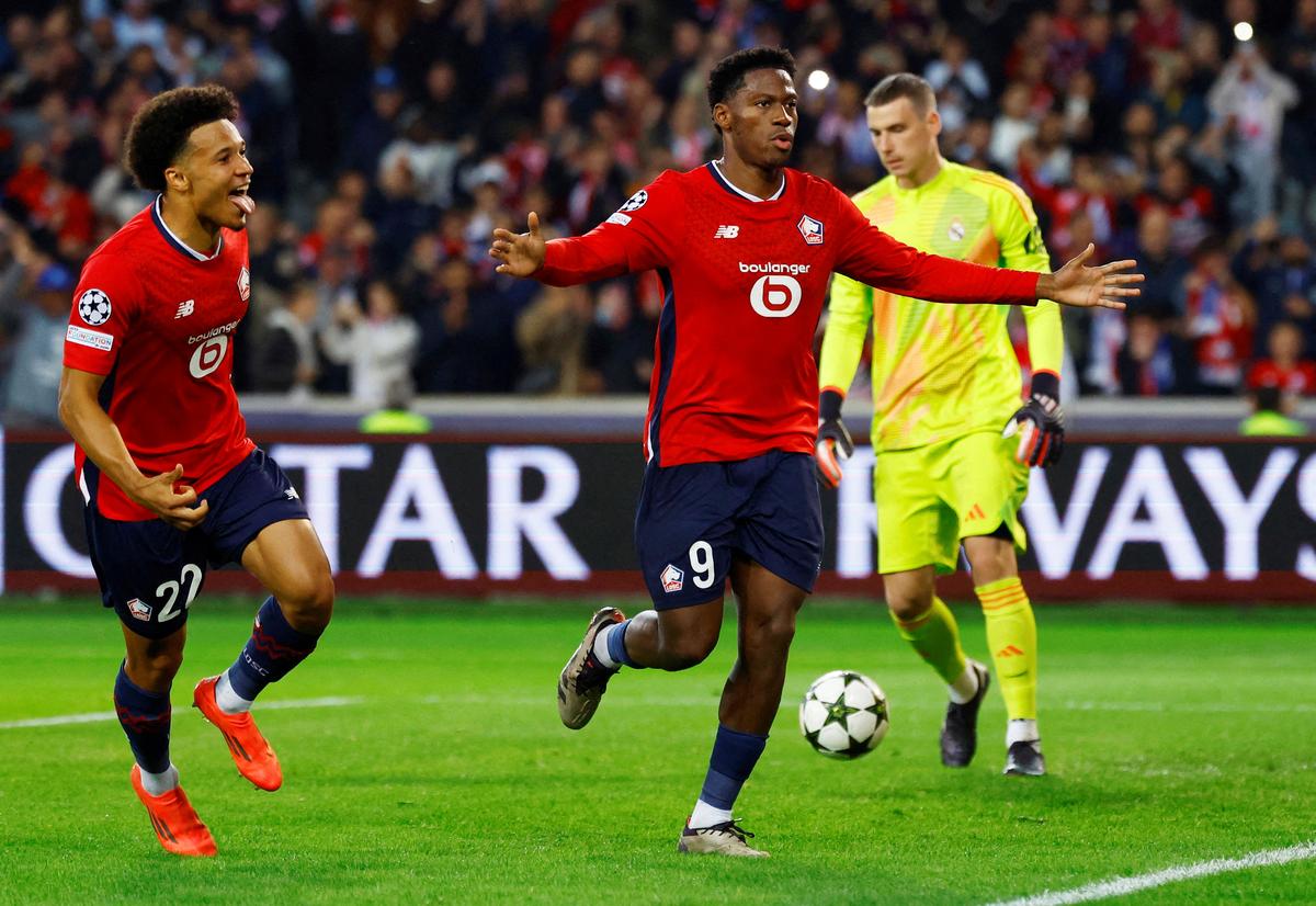 Lille’s Jonathan David celebrates scoring against Real Madrid