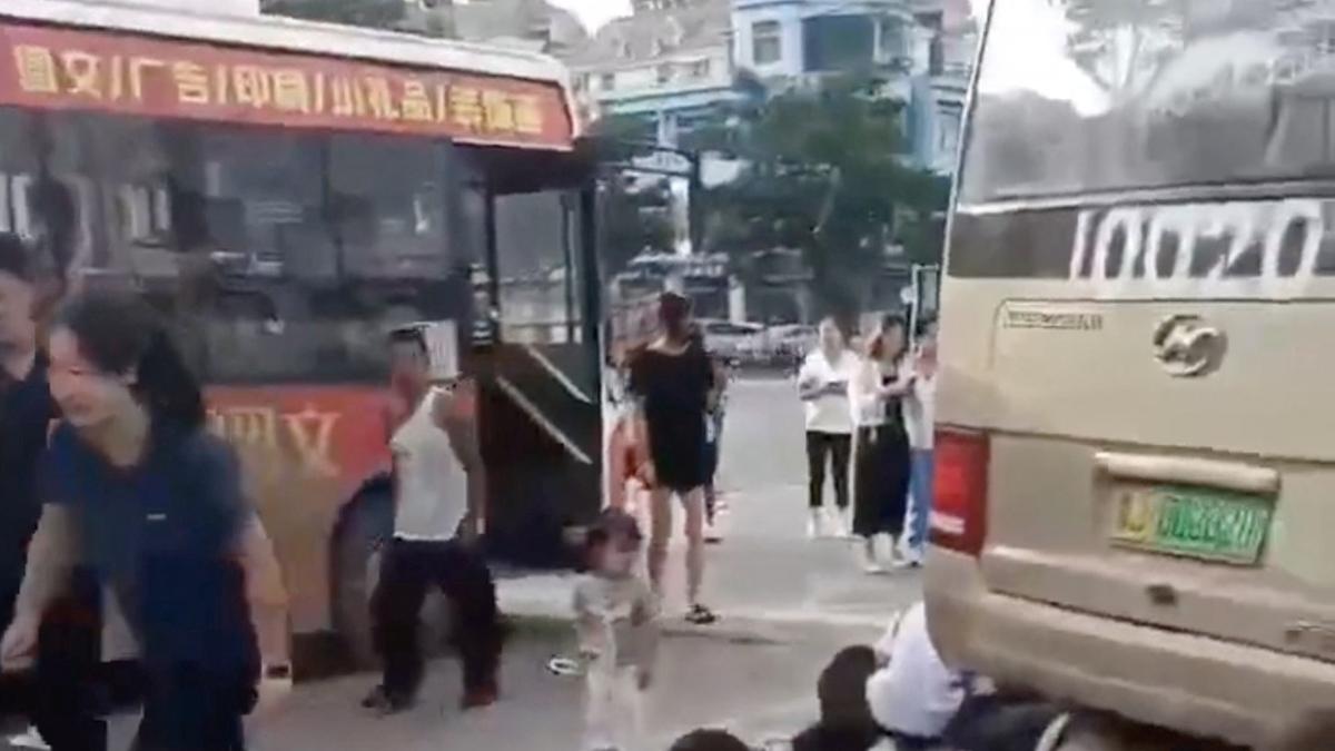 Bus crashes into students and parents in eastern China, leaving 11 dead and 13 injured, police said