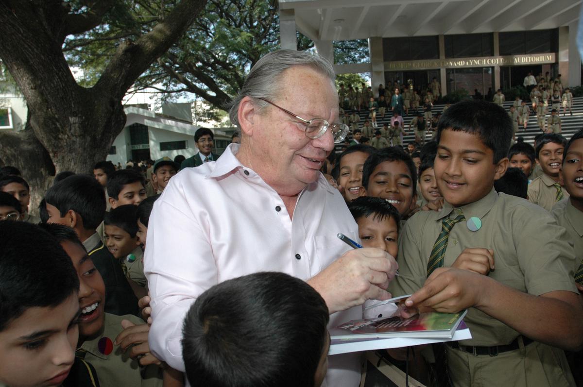 Ruskin Bond signs autographs to students of Bishop Cotton Boy’s School during his visit to the school in Bangalore Ruskin Bond signs autographs to students of Bishop Cotton Boy’s School during his visit to the school in Bangalore