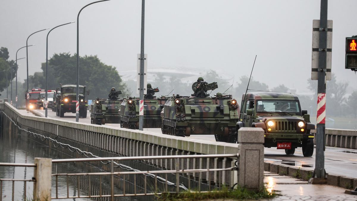 China warns of Taiwan 'war' as military drills encircle island