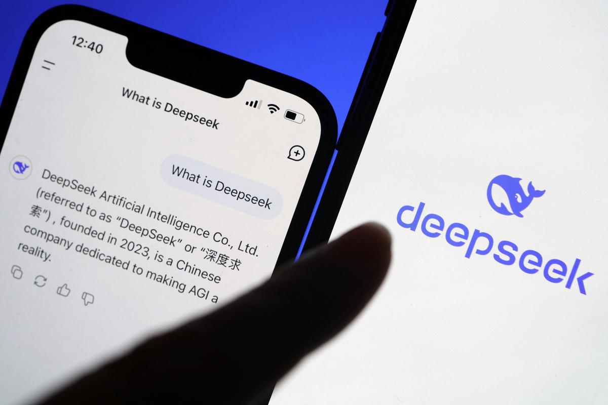 The logo of DeepSeek is displayed alongside its AI assistant app on a mobile phone, in this illustration picture