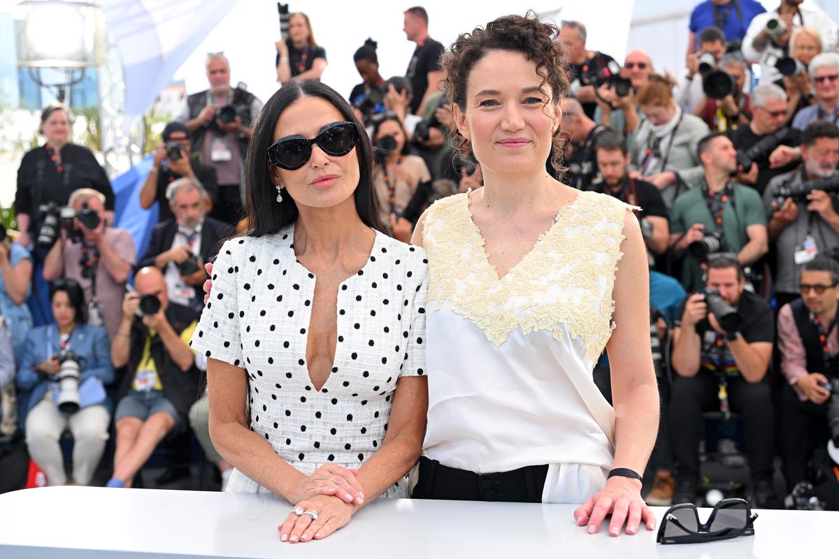 Demi Moore and Coralie Fargeat  attend the ‘The Substance’ Photocall which recieved an 11 minute standing ovation at the 77th annual Cannes Film Festival