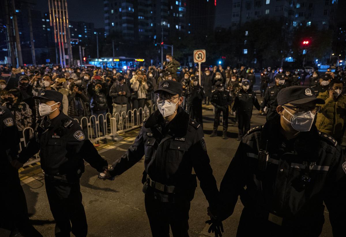 Beijing moves to defuse protests with carrot-and-stick policy, announces plan to boost elderly COVID-19 vaccination