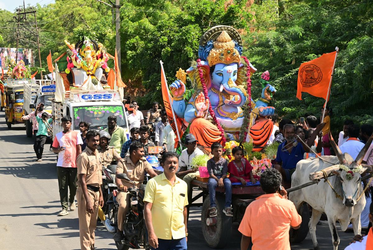 Vinayaka idols being taken in a procession for immersion in Thoothukudi on Sunday.