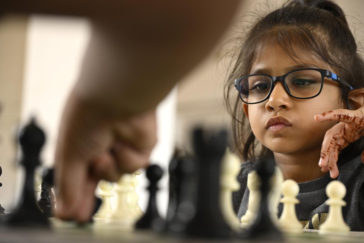 A child engrossed in game at the state-level The Hindu in School Chess Tournament, presented by National Mineral Development Corporation, at the State Art Gallery in Hyderabad’s Madhapur on Sunday.