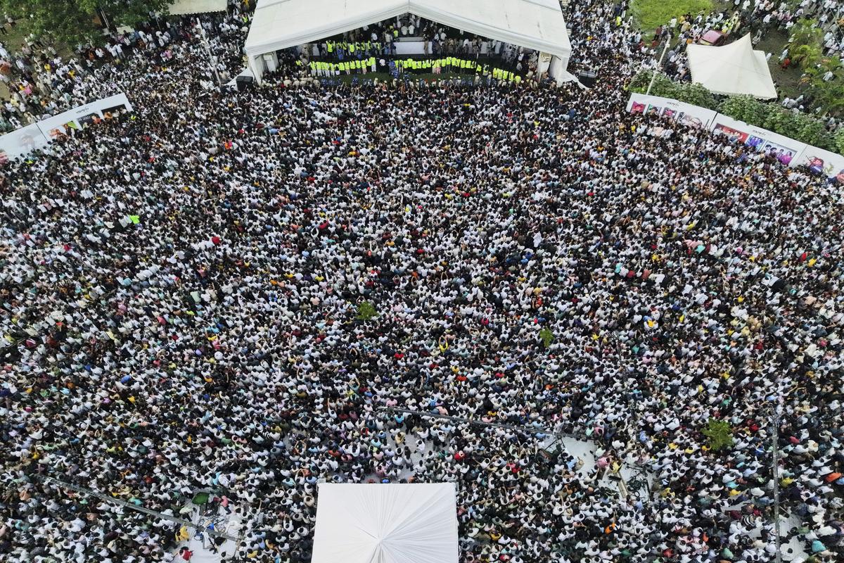 Fans gather to pay homage to the popular Bollywood singer and composer Zubeen Garg in Guwahati, Sunday, Sept. 21, 2025. 