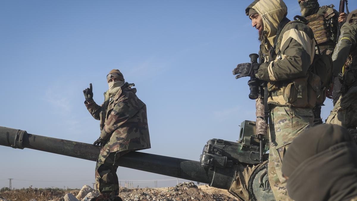 Syrian insurgents capture four central towns as government forces reclaim some territory