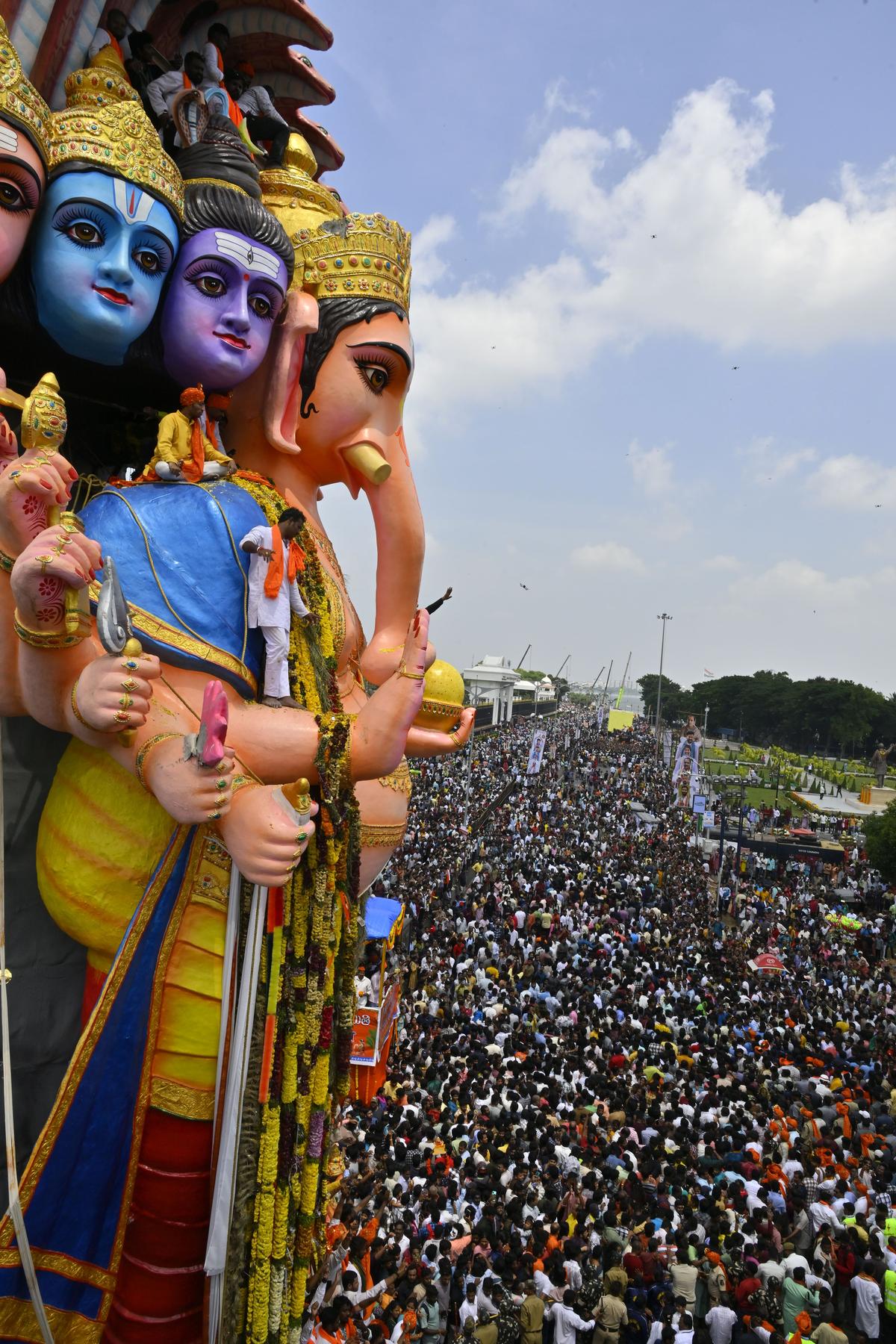 The 70 -feet clay Ganesh idol of Khairatabad, called ‘Sri Saptamukha Maha Shakti Ganapathi’, on the way to immersion in the Hussain Sagar Lake in Hyderabad on Tuesday (September 17, 2024) afternoon. 