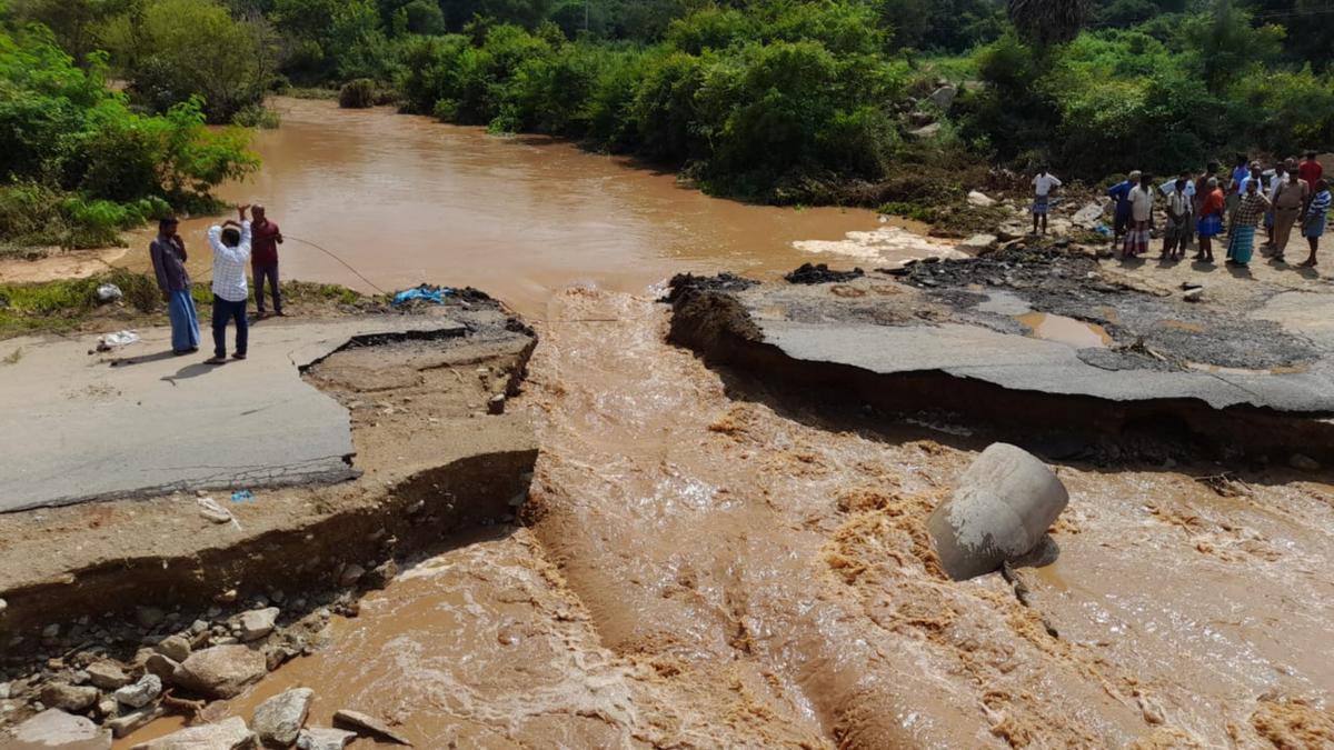 Temporary road washed away by lake breach in Krishnagiri