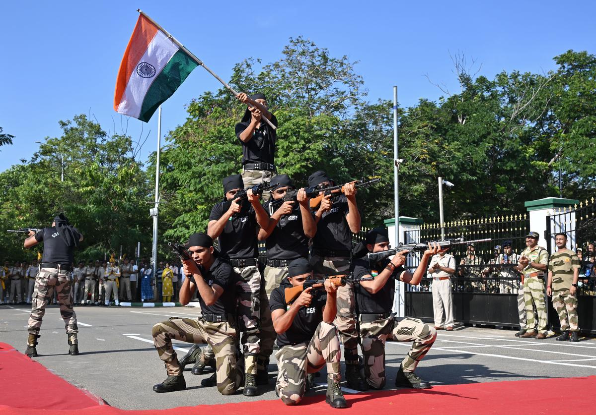 Central Industrial Security Force personnel display their skills at the Republic Day celebration on the Madurai Bench of the Madras High Court campus on Sunday. 