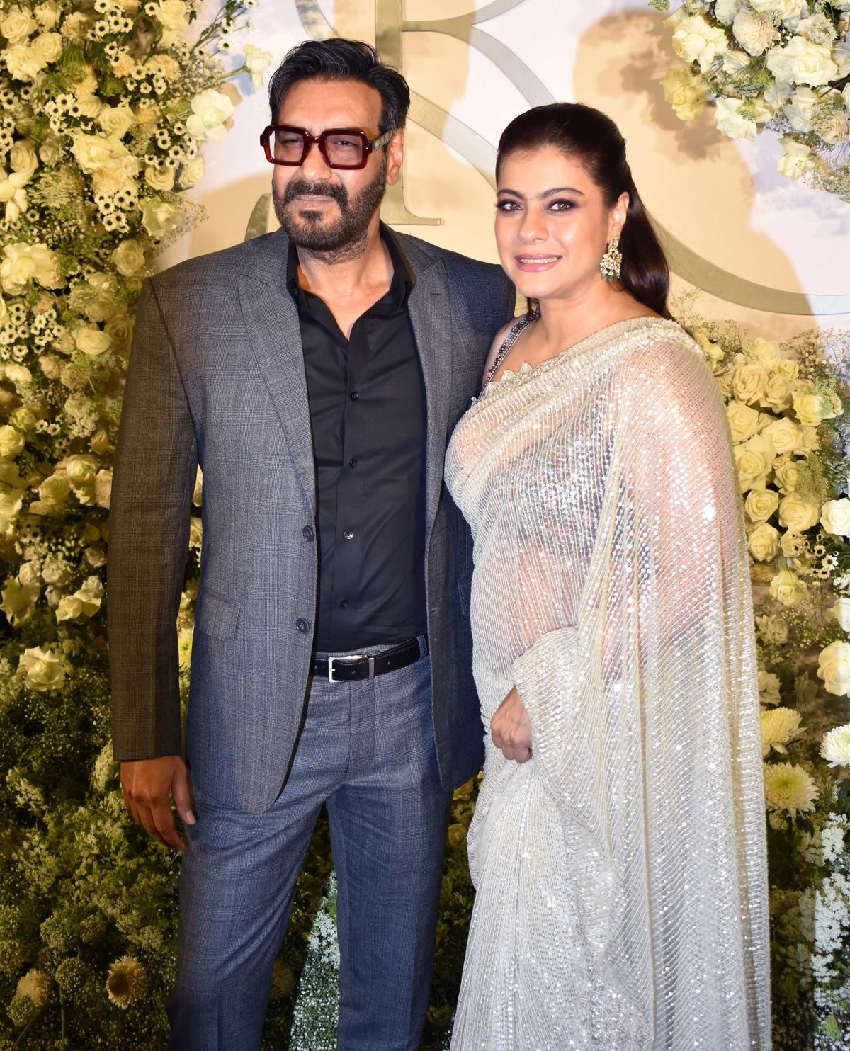 Ajay Devgn and Kajol photographed at the wedding reception 