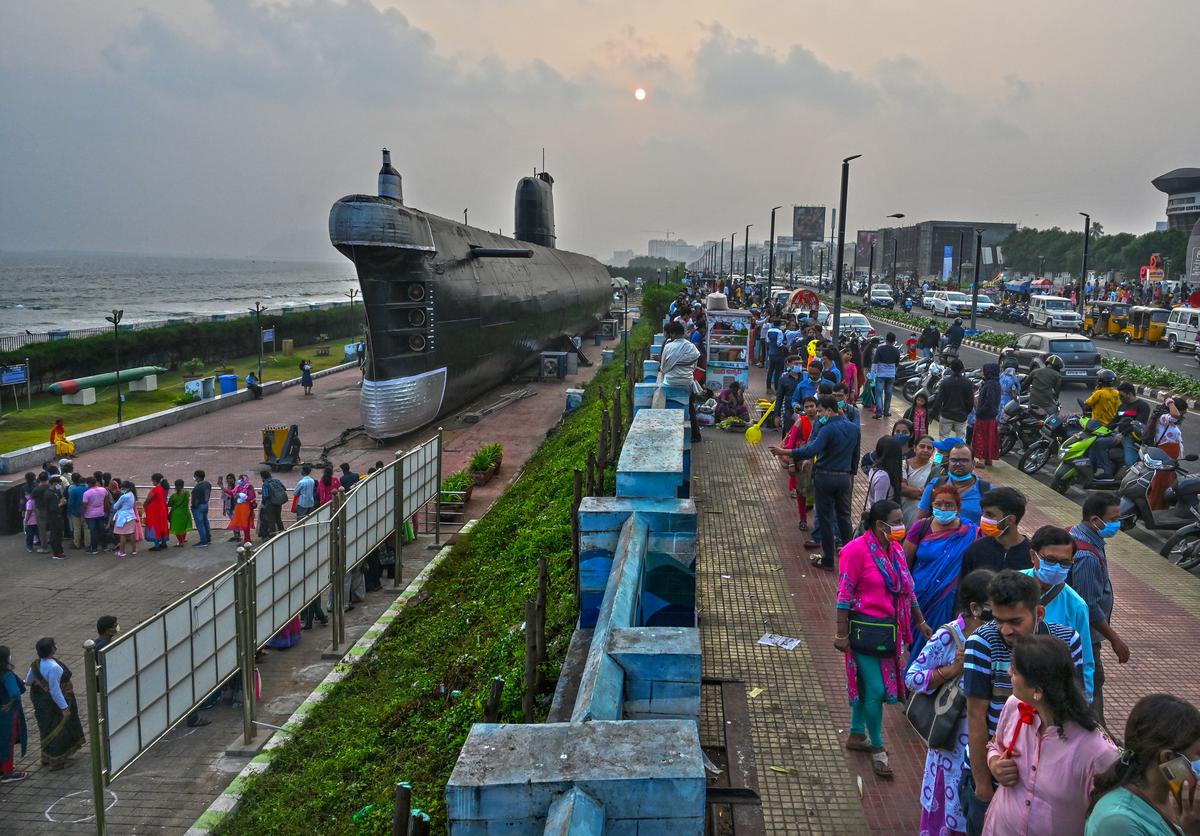 Tourists stand in a long queue at Kursura Submarine Museum in Visakhapatnam.