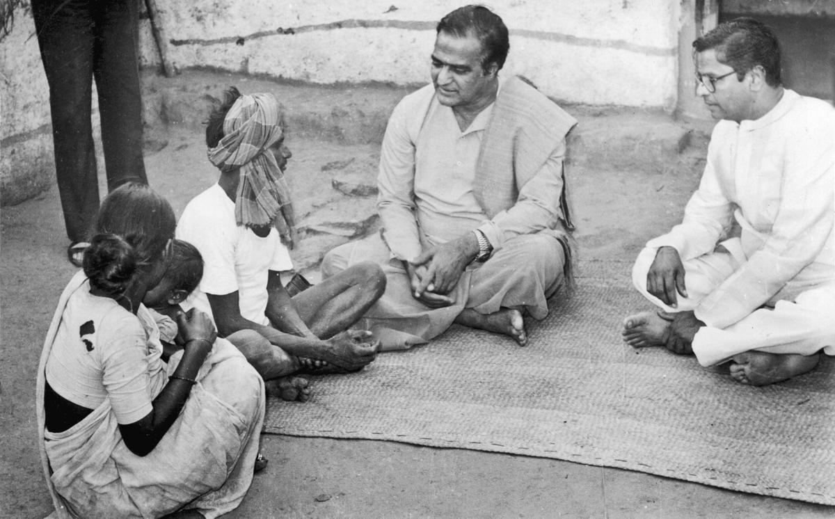 Chief Minister N.T. Rama Rao, during his visit to Miapur on the outskirts of Hyderabad, on February 3, 1984. He went into a hut and enquired about the villager’s family.