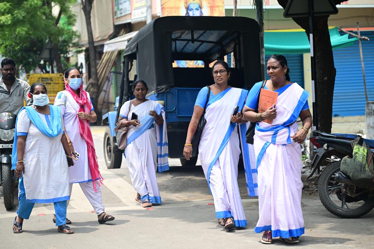 Health teams conducting a door-to-door survey in New Rajarajeswaripeta in Vijayawada on Thursday.