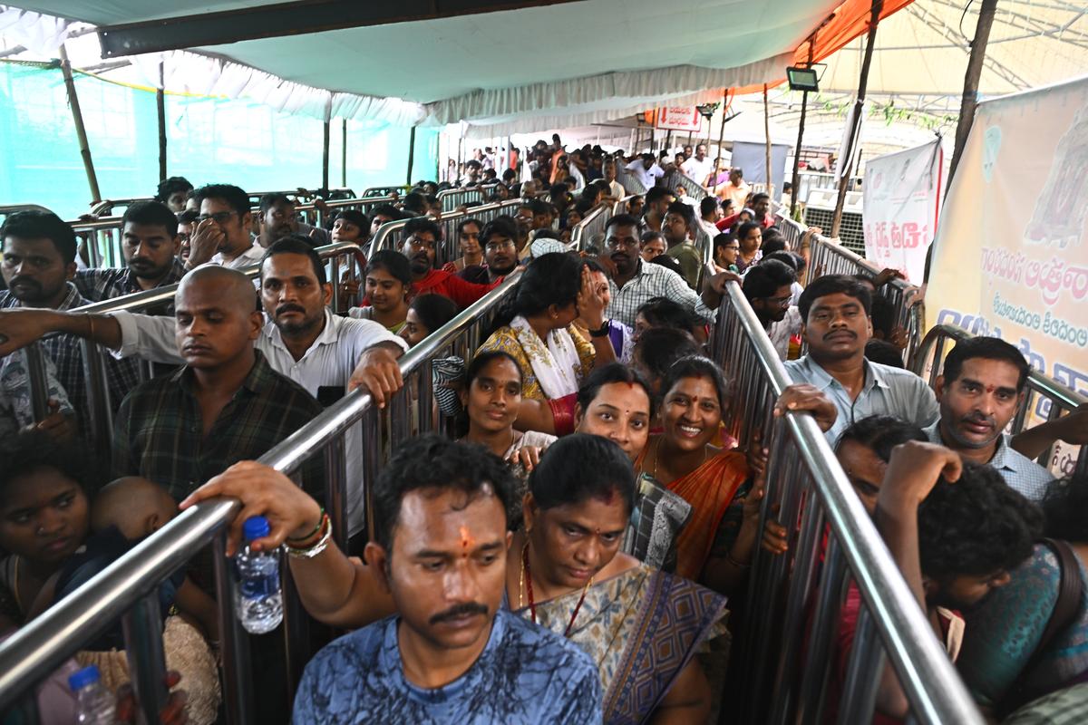 Devotees waiting in queue lines to have a darshan of the Goddess Kanaka Durga atop Indrakeeladri.
