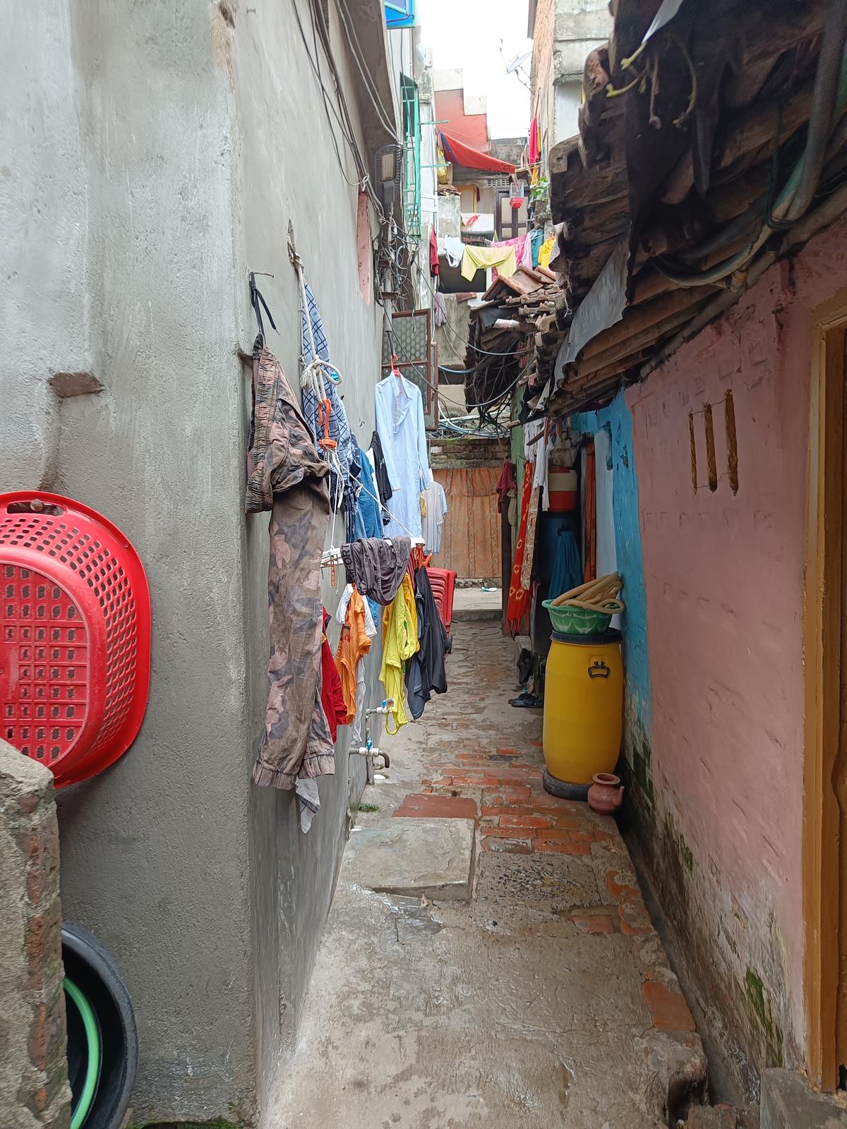 The narrow approach lane which leads to Irshad Alam’s house. 