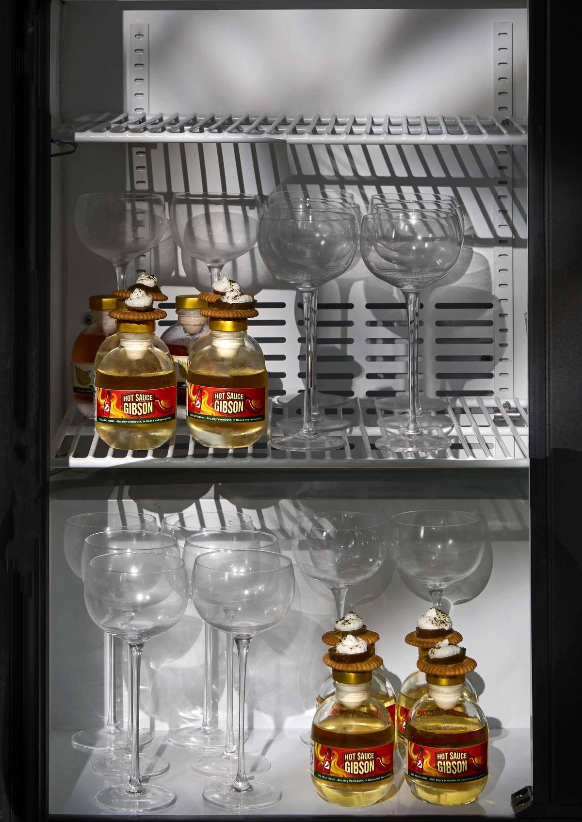 The mini bar stocked with pre-batched cocktails