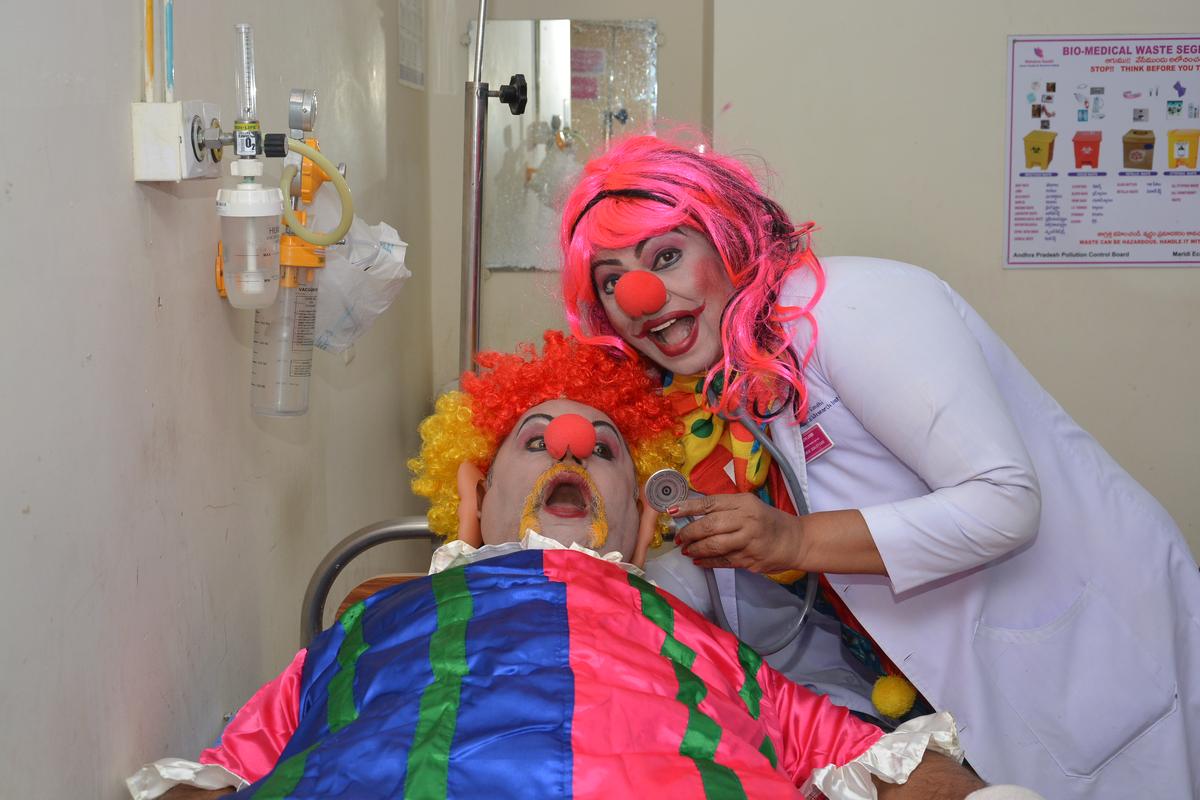 Anantram Ganapati and Meenakshi Anantram in a hospital dressed as medical clowns in Visakhapatnam.