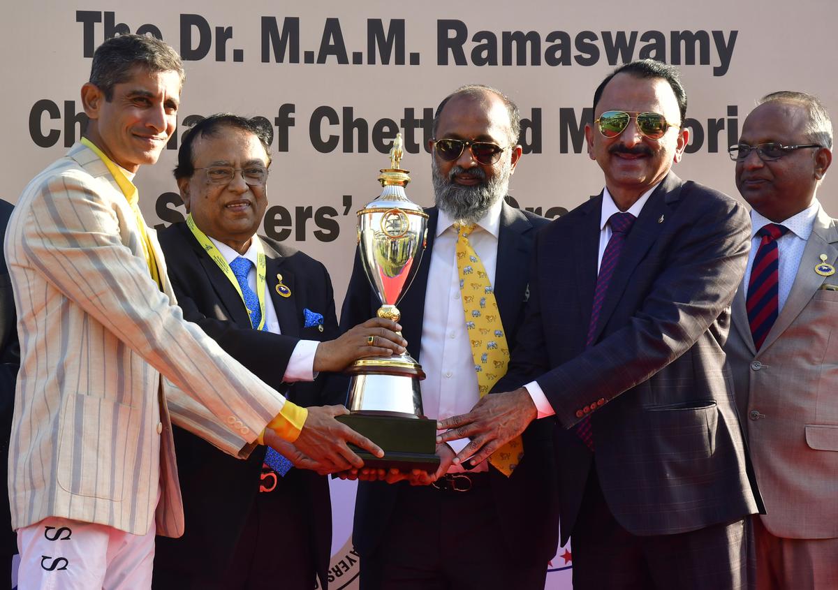 Shivkumar Kheny, chairman, Turf Authorities of India, second from left, presenting the Dr. M. A. M. Ramaswamy Chettiar of Chettinad Memorial Stayers Cup to My Opinion’s trainer B. Suresh and jockey Y.S. Srinath at the Bangalore Turf Club on March 04, 2023.  