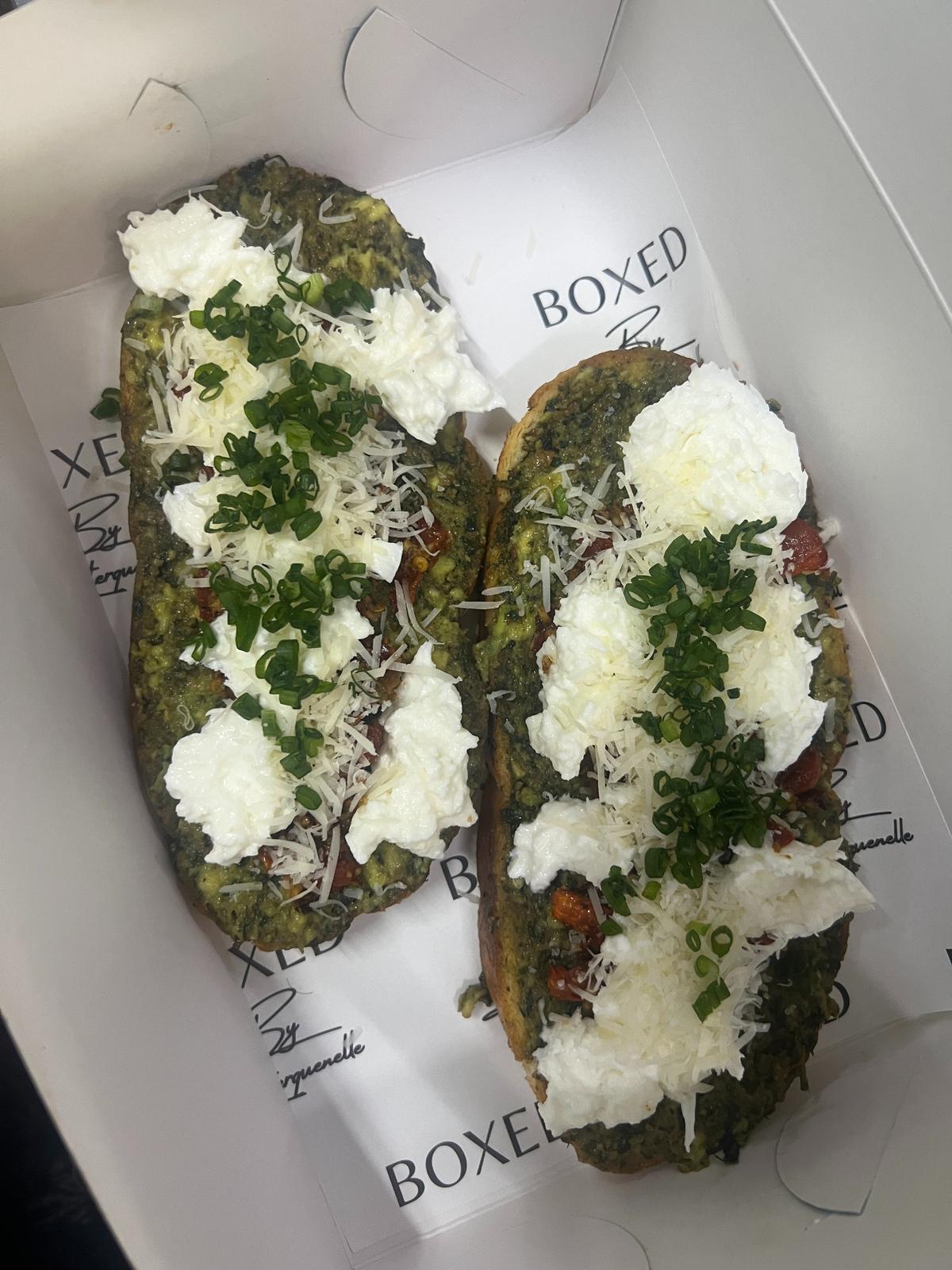 Pesto avocado toastie has basil pesto, creamy avocado, melted cheese and more