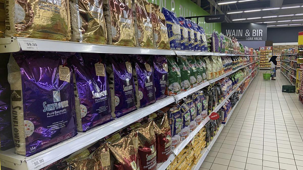 Malaysian PM Anwar Ibrahim warns of action against rice hoarders as prices soar