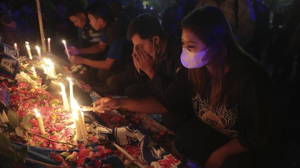 Seventeen children among the dead in Indonesian football stampede