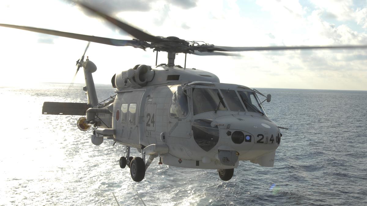 Two Japanese navy helicopters crash during training; one dead, seven missing thumbnail