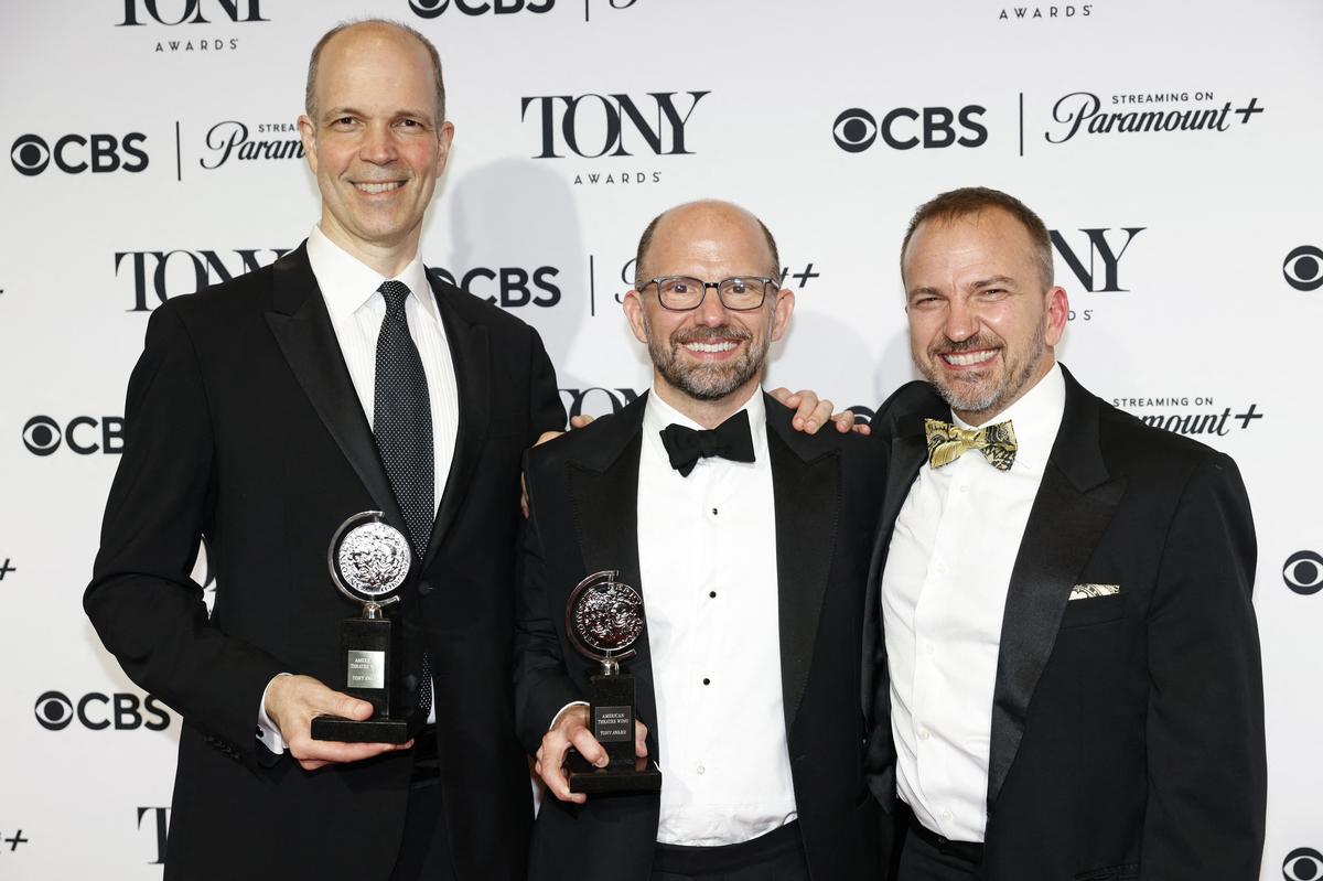 Hank Unger and Matthew Rego pose with the Best Musical award for “The Outsiders” the 77th Annual Tony Awards in New York City, U.S., June 16, 2024.